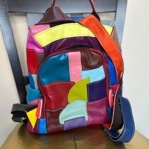Patchwork backpack in bright colors, never used. Genuine Leather.